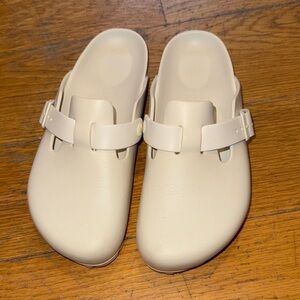 Rubber Birkenstock clogs. Only worn once